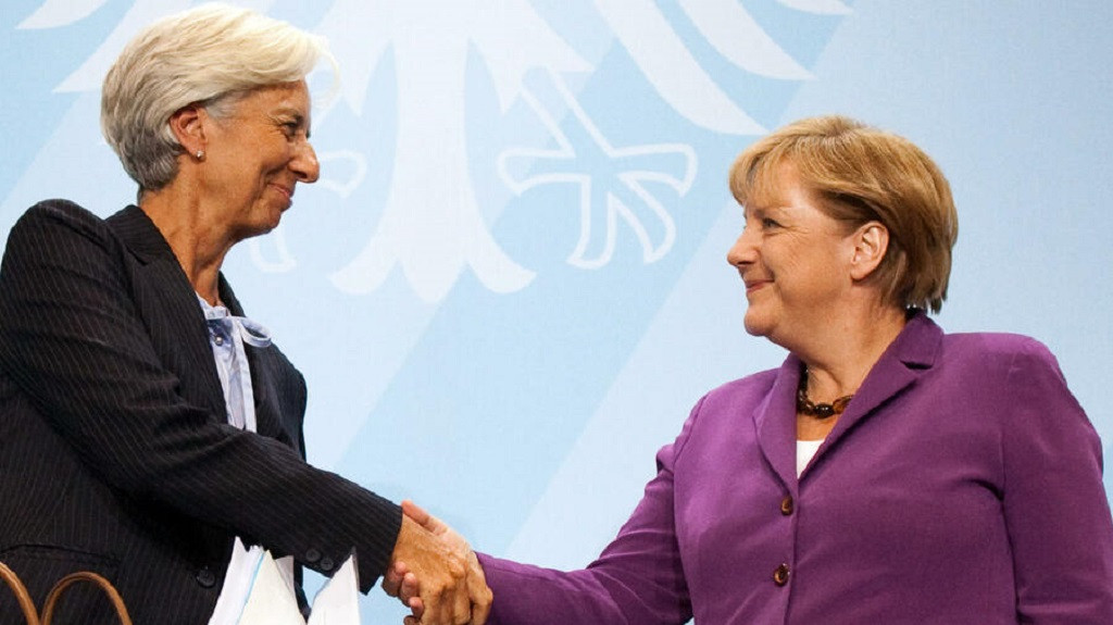 Christine Lagarde saluda a Angela Merkel