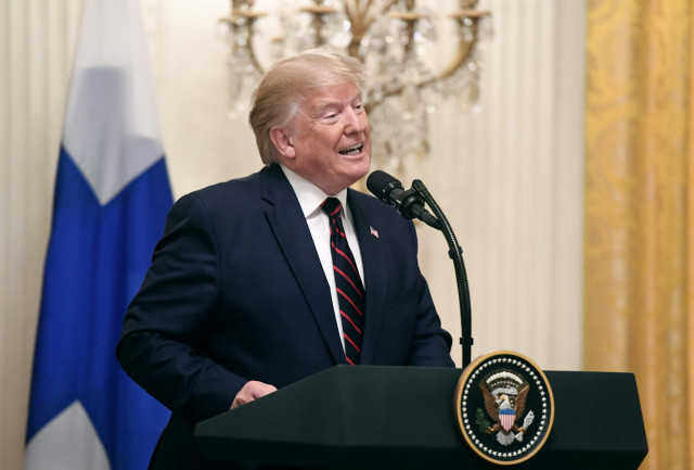 02 October 2019, US, Washington: US President Donald Trump (R) and Finnish President Sauli Niinisto (not pictured) attend a joint press conference at the White House. Photo: Heikki Saukkomaa/Lehtikuva/dpa