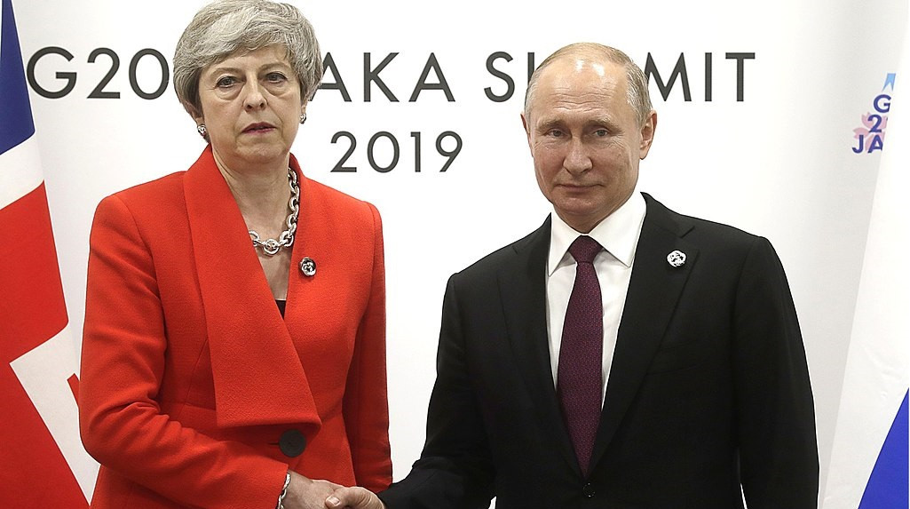 Theresa May con Vladimir Putin