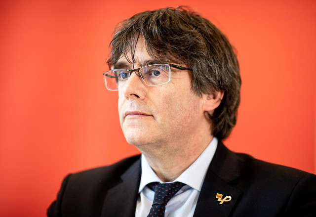 FILED - 03 June 2019, Hamburg: Former President of the Government of Catalonia Carles Puigdemont speaks during a press conference at a hotel complex in Hamburg. A Belgian judge has suspended the extradition of Catalan separatist leader Carles Puigdemont t