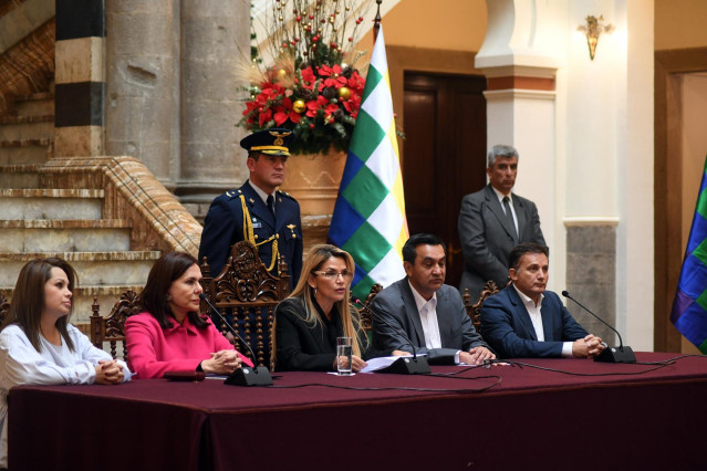 30 December 2019, Bolivia, La Paz: Jeanine Anez (C), interim president of Bolivia, announces the expulsion of several diplomats from Mexico and Spain in an escalation of a diplomatic row. Photo: Reynaldo Zaconeta Caballero/ABI/dpa