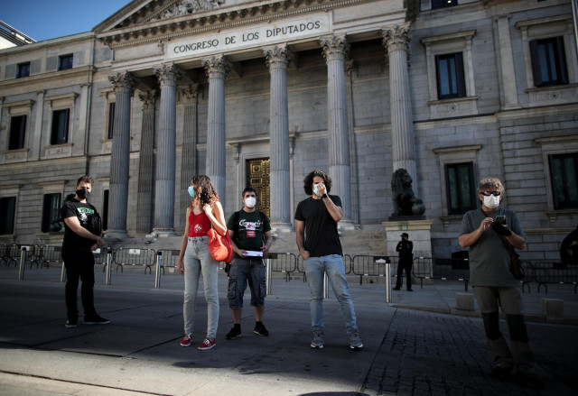 Miembros de la Coordinadora 25S frente al Congreso