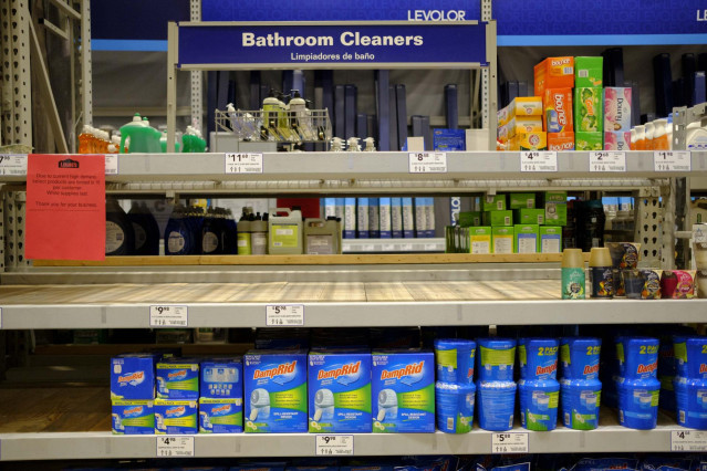 March 11, 2020 - Bloomington, Indiana, United States: Shelves where wipers are sold have been cleared by panic shoppers at Lowe's Home Improvement on the day World Health Organization declared Coronavirus to be a pandemic. Toilet paper, wipes, protective