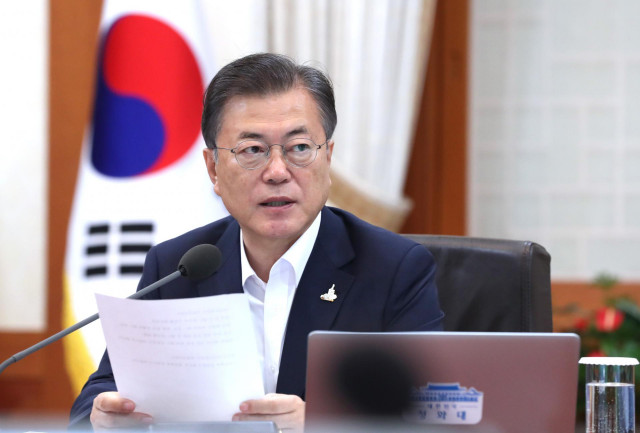 21 July 2020, South Korea, Seoul: South Korean President Moon Jae-in chairs a cabinet meeting at the presidential office Cheong Wa Dae in Seoul. Photo: -/YNA/dpa