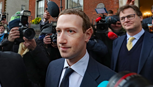 FILED - 04 February 2019, Ireland, Dublin: Facebook CEO Mark Zuckerberg leaves the Merrion Hotel after his meeting with Irish politicians to discuss the regulation of social media and harmful content. Zuckerberg defended the company's cryptocurrency proje