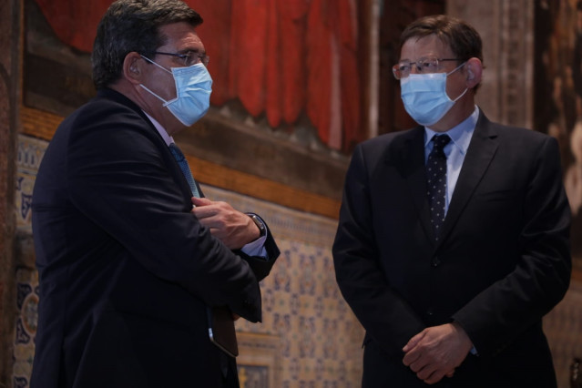 El ministro Jose Luis Escrivá y el president de la Generalitat, Ximo Puig.