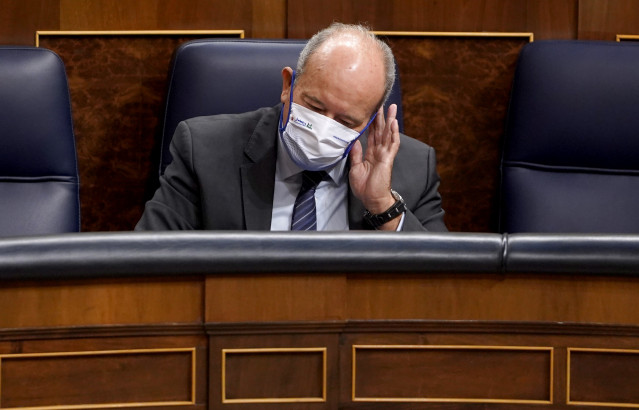 El ministro de Justicia, Juan Carlos Campo, sentado en su escaño durante una sesión de control al Gobierno en el Congreso. En Madrid (España), a 23 de septiembre de 2020.