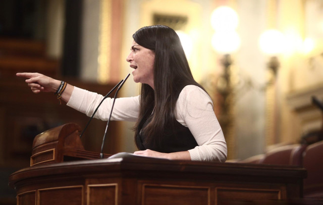 La portavoz adjunta de Vox en el Congreso de los Diputados, Macarena Olona, interviene durante una sesión plenaria en la Cámara Baja, en Madrid (España), a 3 de diciembre. El Pleno del Congreso ya ha finalizado la votación de enmiendas parciales al proyec