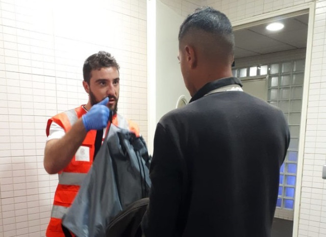 Atención a migrantes en una imagen de archivo