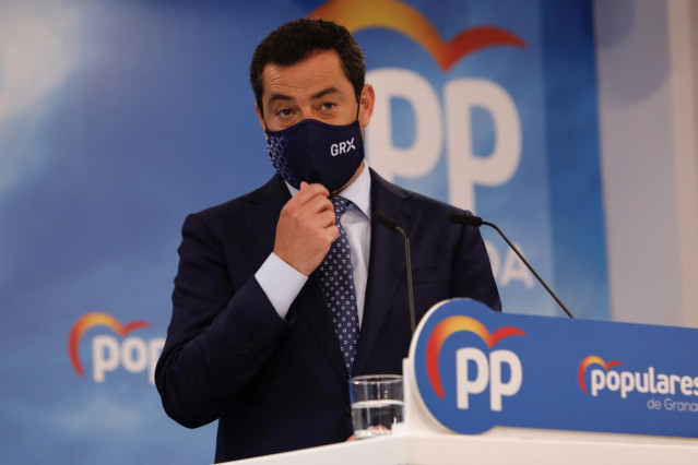 Archivo - El presidente del PP-A y de la Junta, Juanma Moreno,, interviene en  la reunión de el  Consejo Provincial de Alcaldes y Portavoces del PP de Granada a 09 de abril 2021