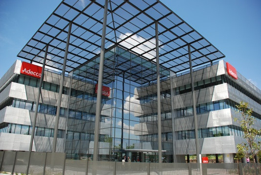 Archivo - Sede de Adecco en Madrid