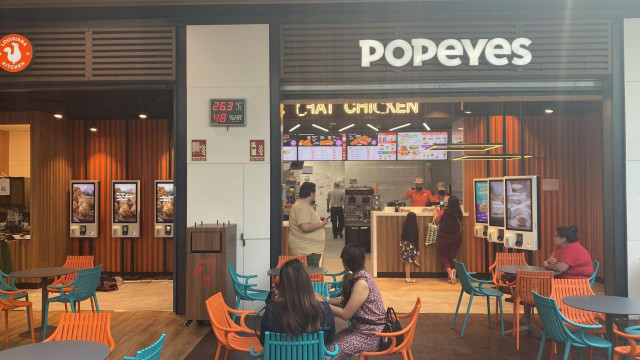 Archivo - Restaurante Popeyes.