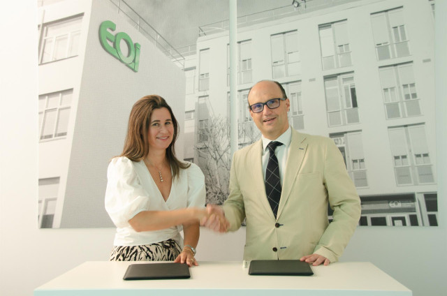 García y Bidart al firmar el acuerdo
