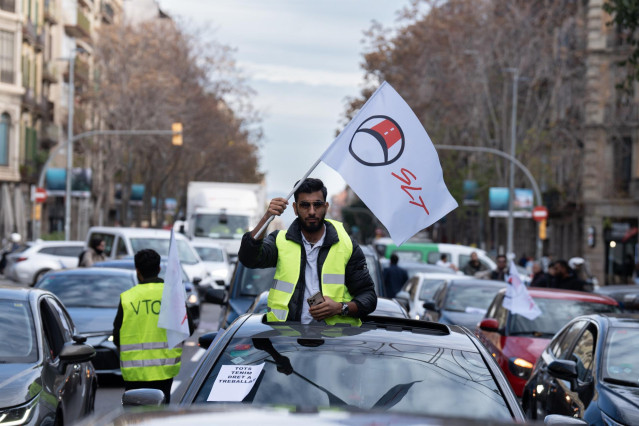 Uno de los manifestantes de la marcha de VTC en Barcelona.