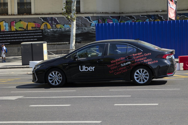 Archivo - Un taxi de Uber en la zona de Atocha, a 24 de agosto de 2023