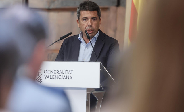 El president de la Generalitat Valenciana, Carlos Mazón, interviene durante la firma del convenio de colaboración entre la Generalitat y PowerCo, en el Palau de la Generalitat, a 9 de julio de 2024, en Valencia, Comunidad Valenciana (España). El convenio