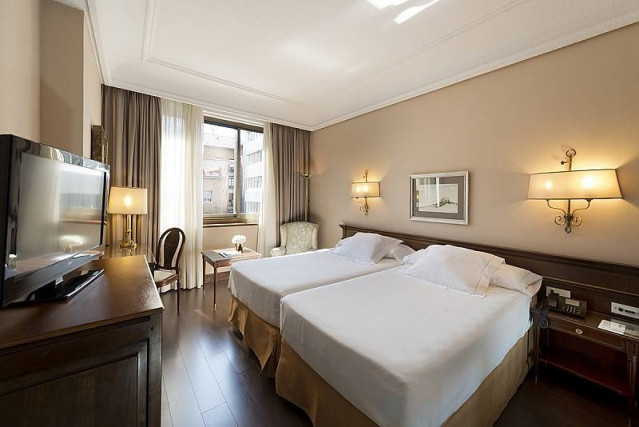Archivo - Habitación del hotel Miguel Ángel.