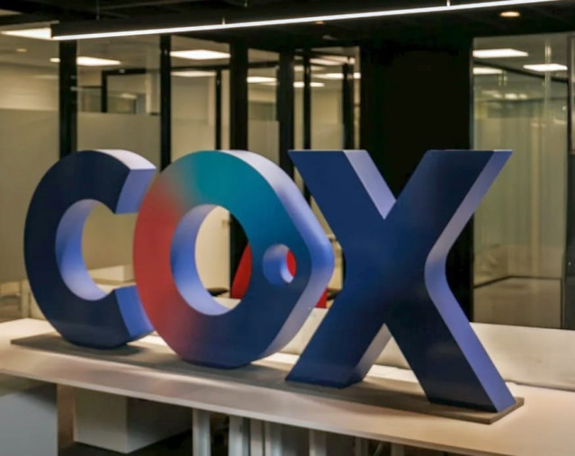 Logo de Cox