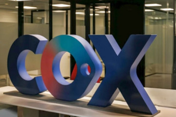 Logo de Cox.