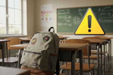 Un aula de una escuela; alerta   CANVA