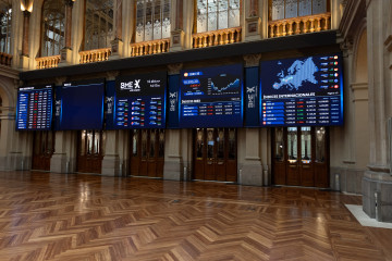 Archivo - Paneles del Ibex 35 en el Palacio de la Bolsa, a 16 de abril de 2024, en Madrid (España).