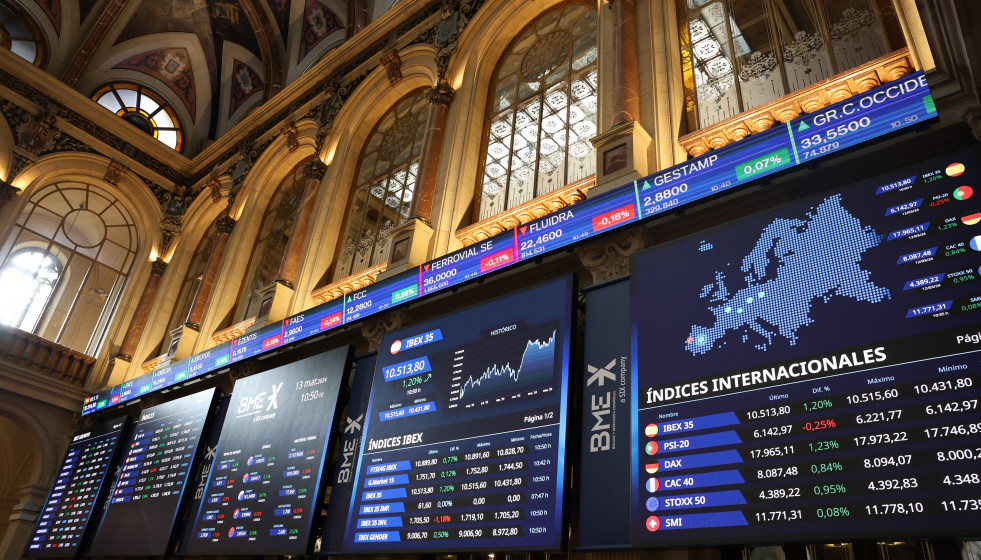Archivo - Paneles del Ibex 35 en el Palacio de la Bolsa, a 13 de marzo de 2024, en Madrid (España).