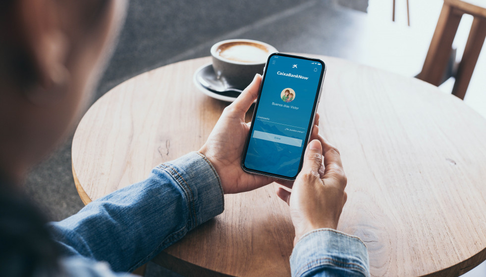 EuropaPress 4098672 cell phone mockup image blank white screenwoman hand holding texting using (1)