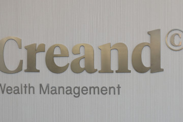 Archivo - Logo de Creand Wealth Management.