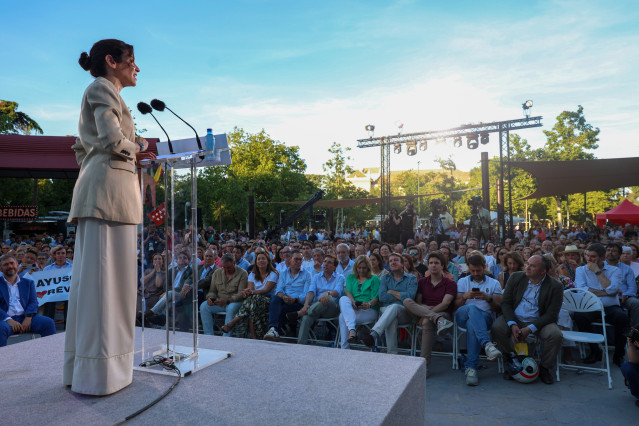 La presidenta de la Comunidad de Madrid y del PP de Madrid, Isabel Díaz Ayuso, interviene durante el acto de balance político celebrado en el Parque de Berlín, a 22 de mayo de 2026, en Madrid (España).