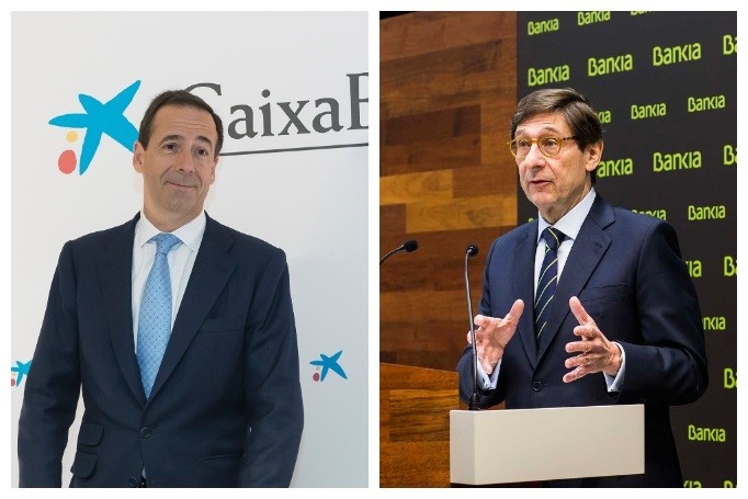 Gonzalo Gortázar, consejero delegado de CaixaBank (izq), y José Ignacio Goirigolzarri, presidente de Bankia (der).