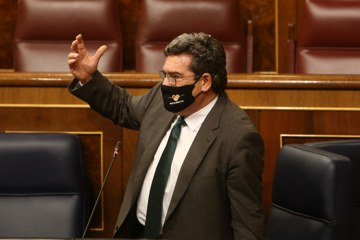 El ministro de Seguridad Social, Inclusión y Migraciones, José Luis Escrivá, interviene durante una sesión de control al Gobierno, en Madrid (España), a 16 de diciembre de 2020. Esta sesión de control al Ejecutivo se celebra tras siete horas de debate sob