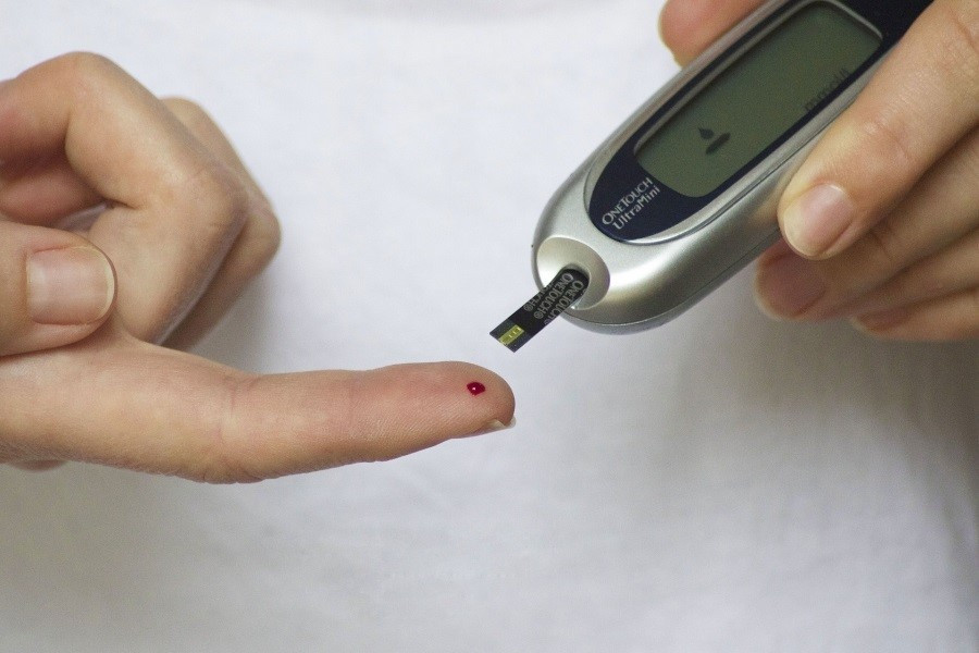 A person suffering from diabetes controls his blood sugar level.